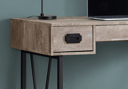 Close-up of the Computer Desk For Home Office with storage drawers and black handles, shown with a black lamp and open laptop on its wooden top, against a green wall. Ideal for laptops and home office use.