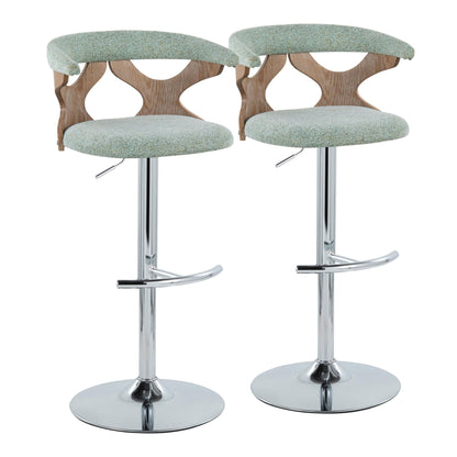 A set of two Gardenia contemporary adjustable barstools with swivel seats, light green upholstery, wooden backrests with cut-out accents, and shiny chrome bases featuring rounded T footrests, arranged side by side.