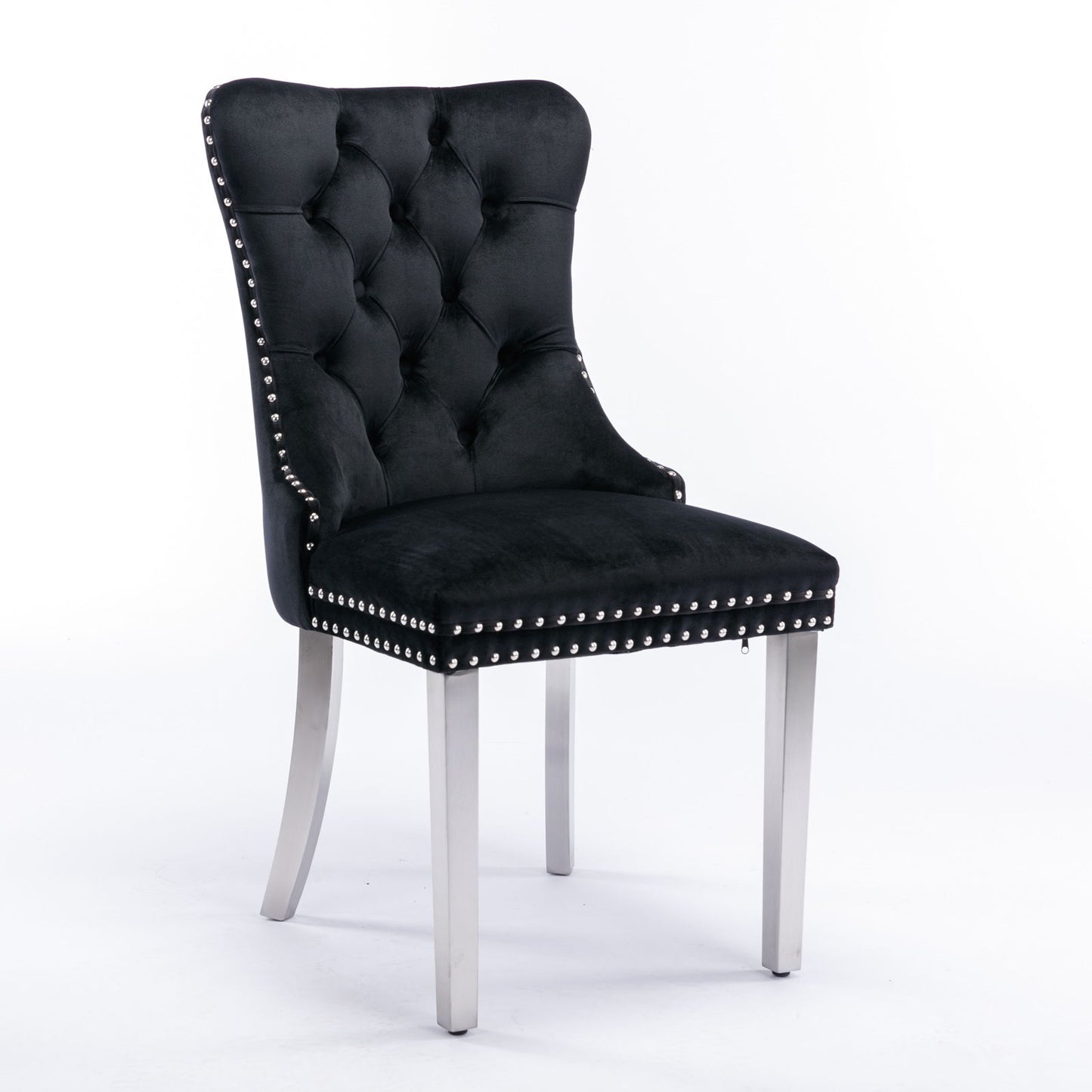 The Nikki set includes two modern, high-end dining chairs featuring black velvet upholstery, tufted backs, nailhead trim, and chrome stainless steel plated legs, shown against a white background.