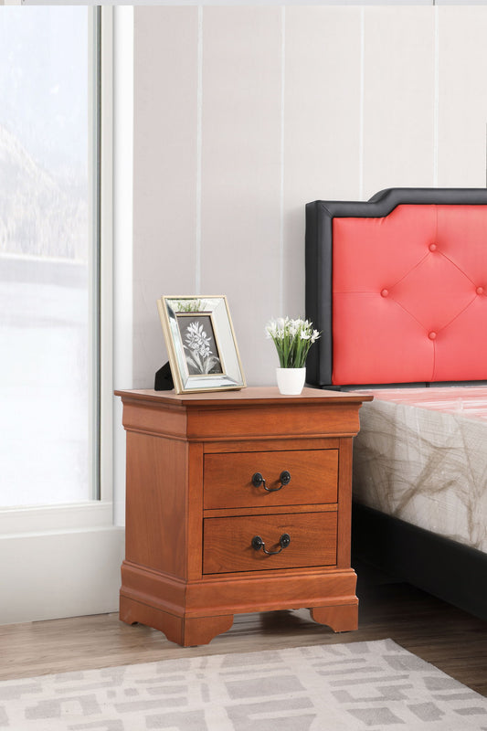 A Louis Phillipe - Nightstand - Wood with two drawers sits next to a bed with a red and black headboard. On the nightstand are a framed photo and small potted plant. A window and part of a rug are also visible.
