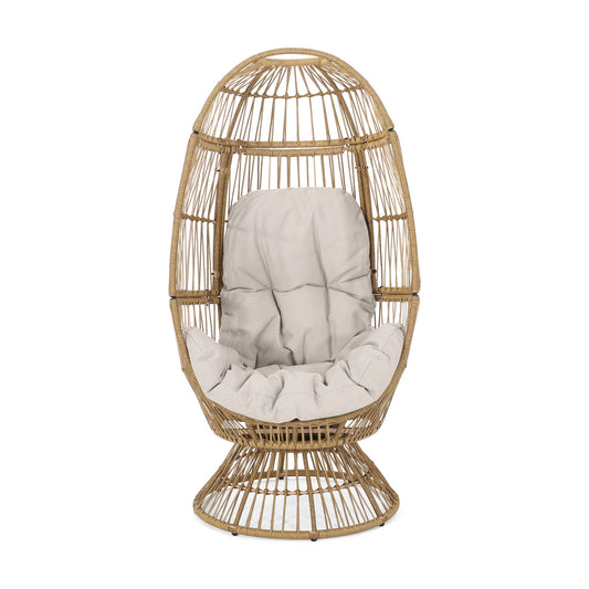 The Patio Swivel Basket Egg Chair With Cushion features an open, woven rattan frame in an egg shape and includes a light beige tufted cushion on the seat and back, shown against a white background.