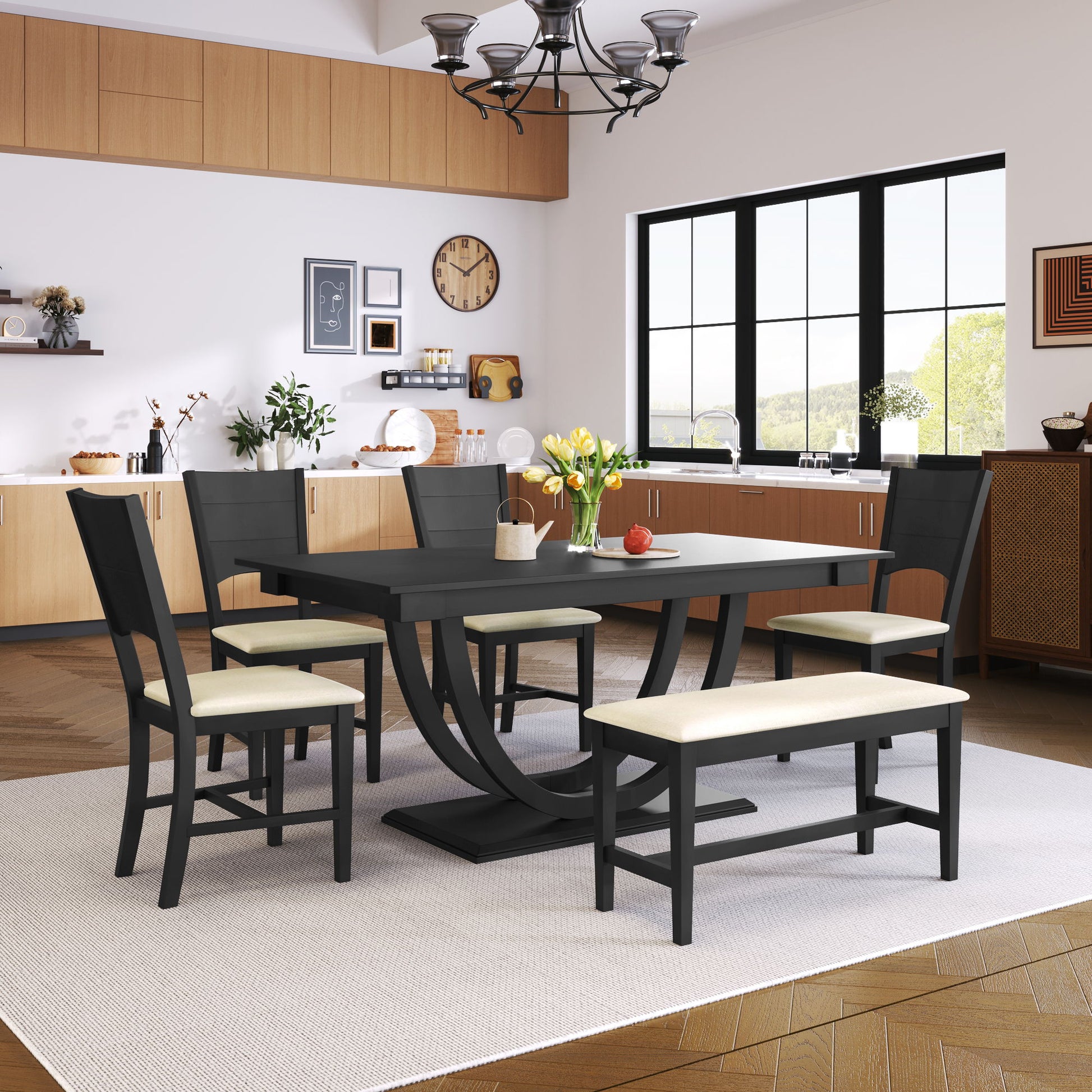 Modern kitchen featuring the Topmax 6 Piece Wood Half Round Dining Table Set with a long bench and four chairs. Light wood cabinets, large windows, decor accents, and a chandelier create a bright, stylish space.