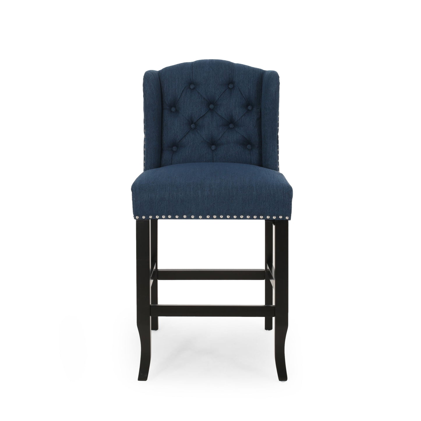 The Vienna - Fabric Tufted Counter Stool With Nailhead Accents (Set of 2) features navy blue upholstery, a tufted backrest, silver nailhead trim, and black wooden legs with a footrest, displayed against a white background.