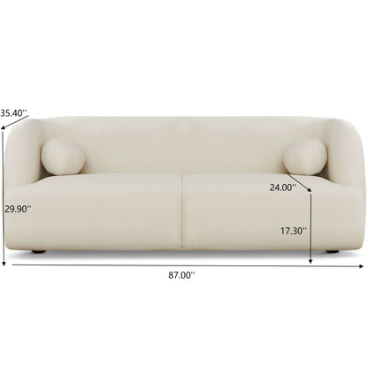 The Anna - French Boucle Sofa is a modern cream-colored piece with two round cushions; dimensions: 87" W, 35.4" H, 29.9" arm height, 24" seat depth, and 17.3" seat height.