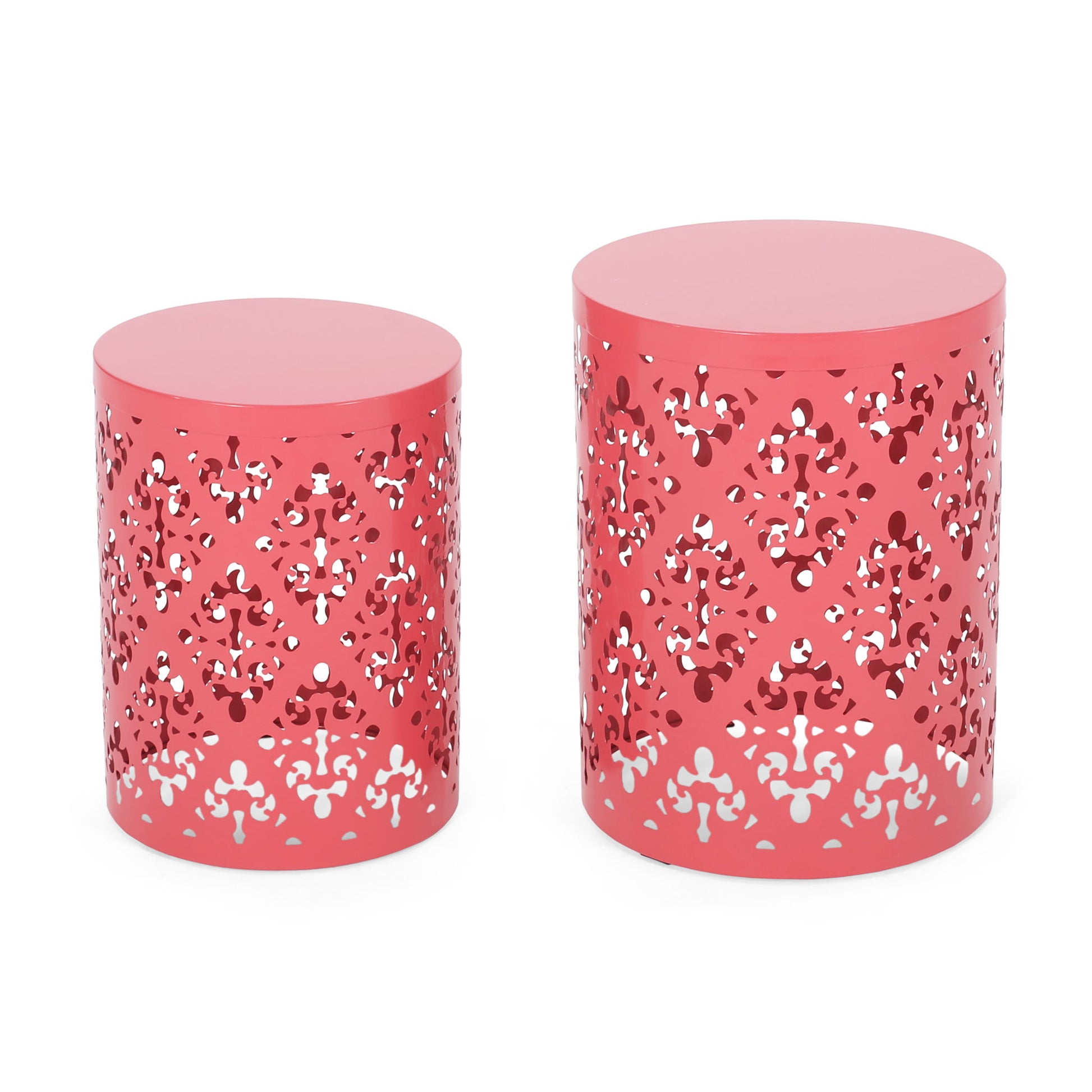 Set of two Outdoor Metal Modern Design End Tables in coral, featuring intricate cut-out geometric patterns. Cylindrical design with solid flat tops; tables differ in height and width.