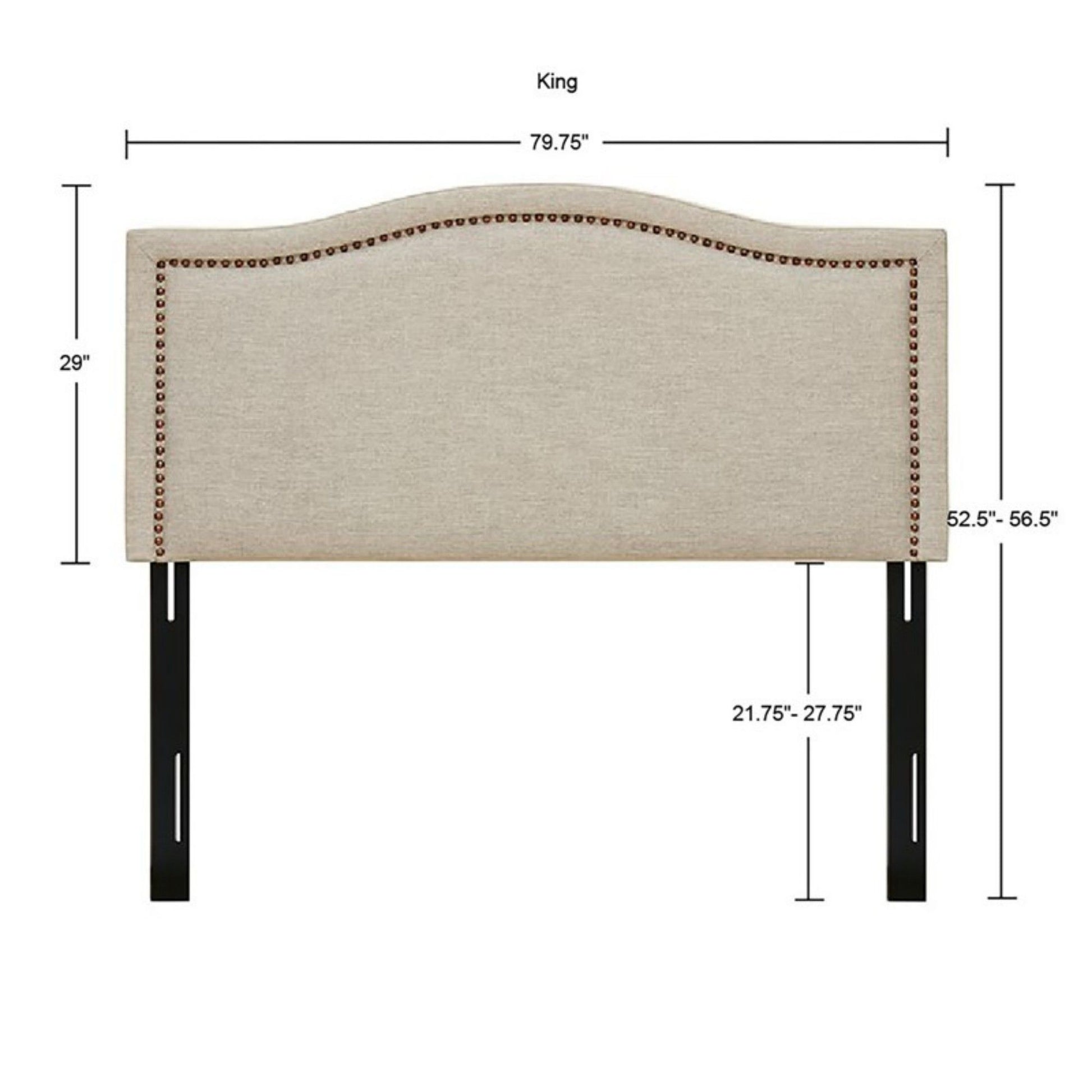 The Elegant Panel Headboard features beige upholstery, copper nailhead trim, and adjustable black metal legs. Measures 79.75"W x 29"H; leg height adjusts 21.75"-27.75", for a total headboard height of 52.5"-56.5".