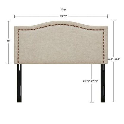The Elegant Panel Headboard features beige upholstery, copper nailhead trim, and adjustable black metal legs. Measures 79.75"W x 29"H; leg height adjusts 21.75"-27.75", for a total headboard height of 52.5"-56.5".