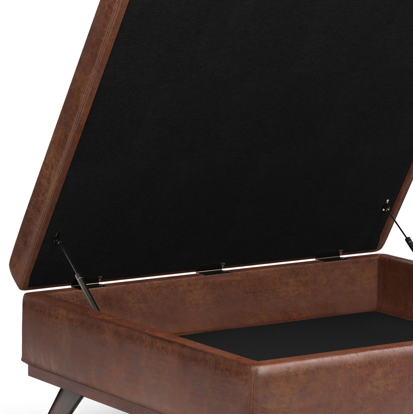 A close-up of the Owen Multifunctional Square Coffee Table Storage Ottoman, shown open with a brown faux leather finish, hinged lid, spacious black-lined interior, and sturdy metal support hinges.