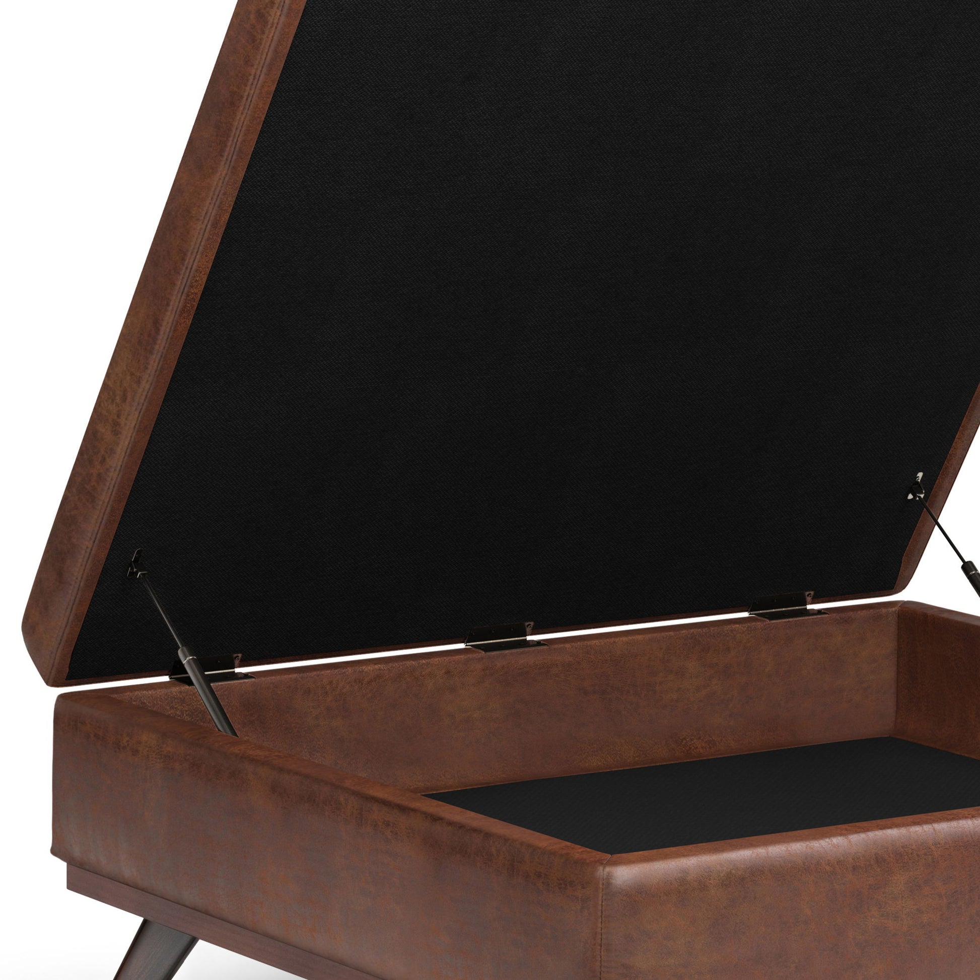 A close-up of the Owen Multifunctional Square Coffee Table Storage Ottoman, shown open with a brown faux leather finish, hinged lid, spacious black-lined interior, and sturdy metal support hinges.