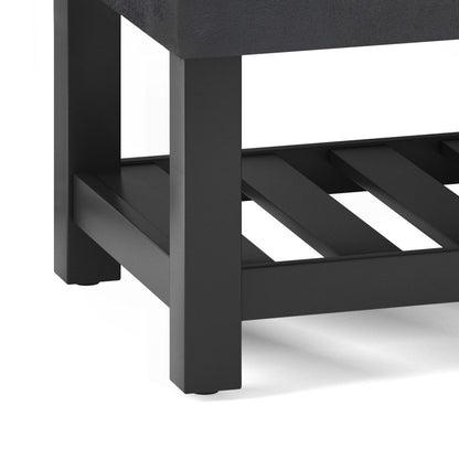 Close-up of the Cosmopolitan - Storage Ottoman Bench With Open Bottom, highlighting its sturdy black metal square legs and a slatted lower shelf.