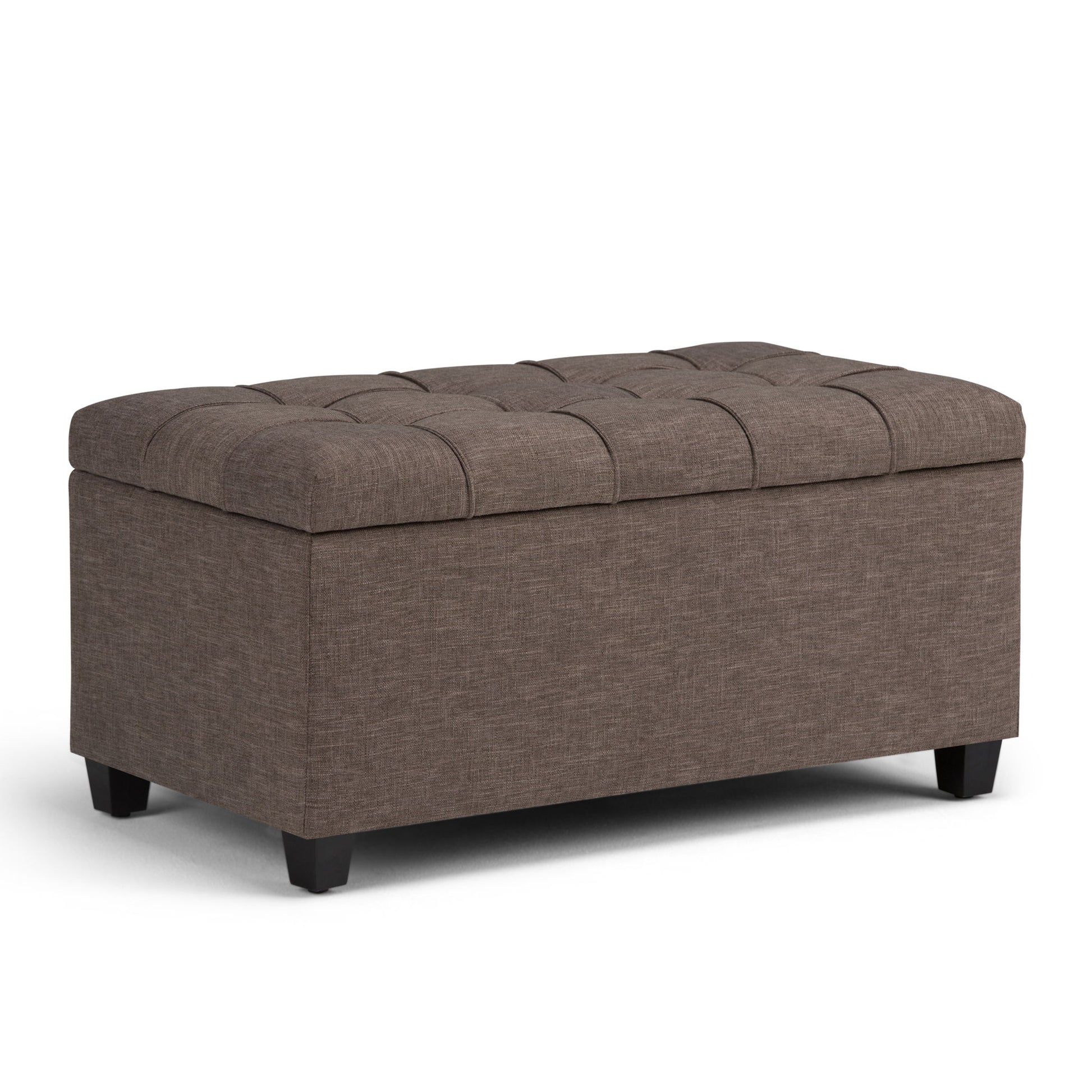 The Sienna Upholstered Storage Ottoman Bench features a brown tufted top, rectangular shape, and short black legs, shown against a white background.