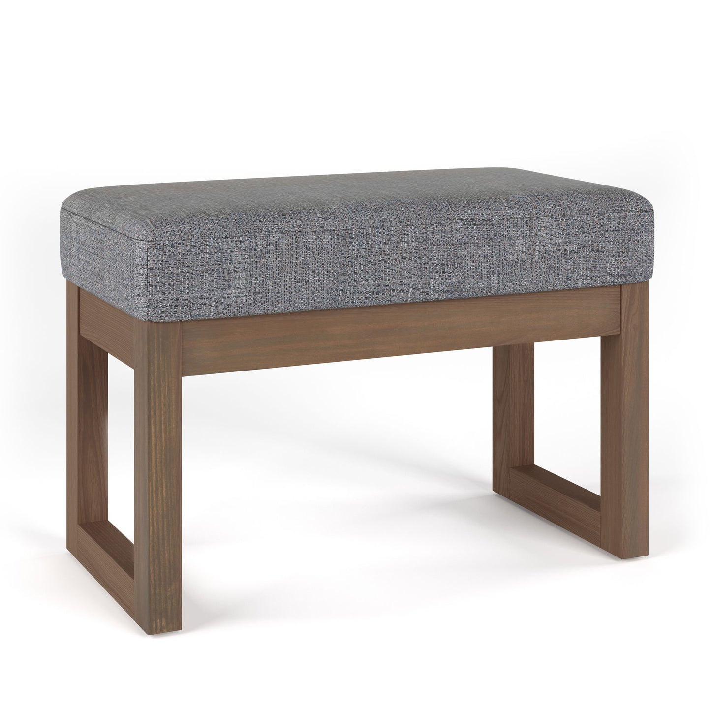 The Milltown Upholstered Ottoman Bench features a cushioned gray fabric seat and a wooden base with clean, rectangular lines, shown against a plain white background.