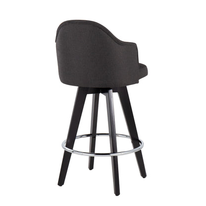 The Ahoy set of 2 counter stools features dark gray upholstery with curved backrests, black wooden legs, and circular chrome footrests against a white background.