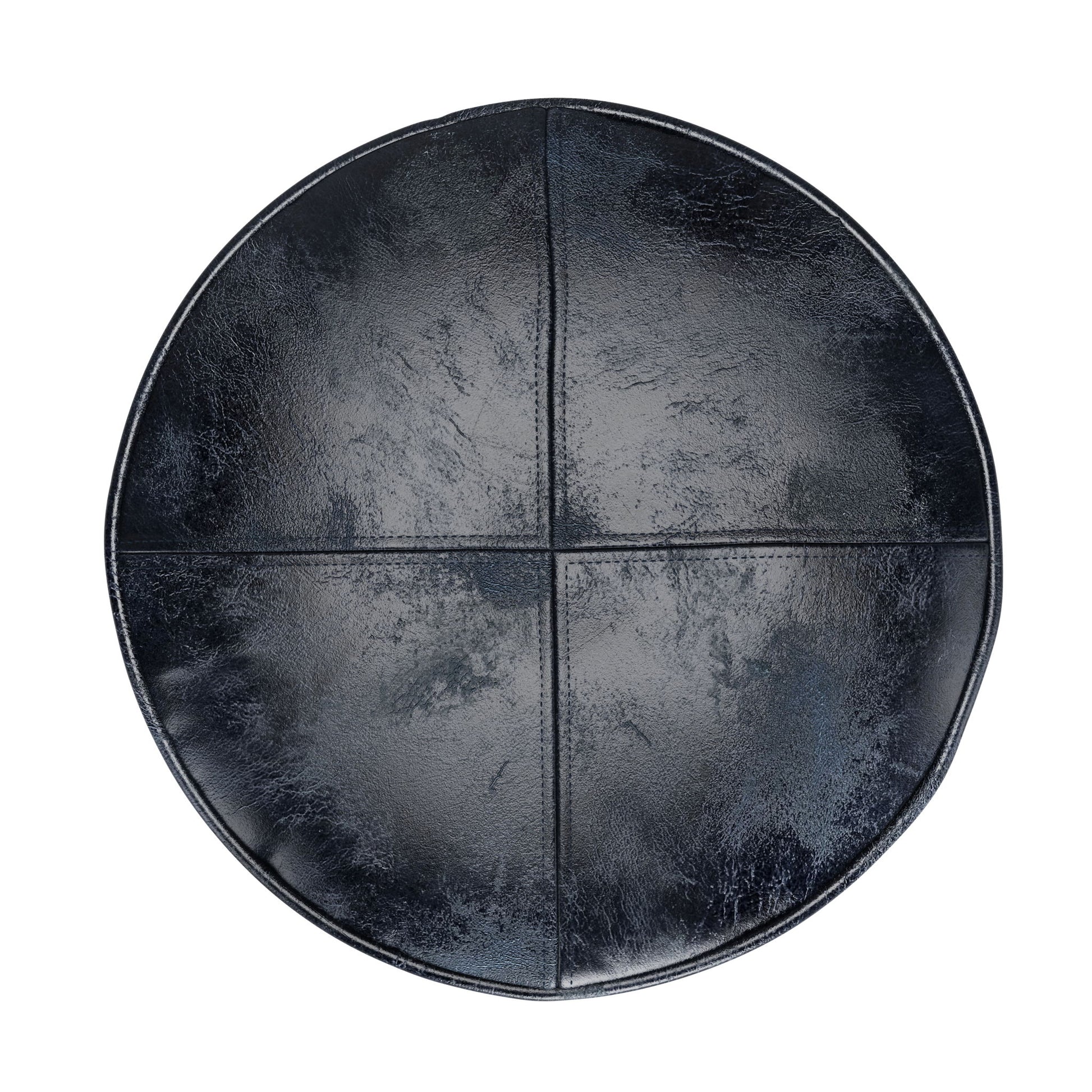 The Connor - Handcrafted Round Pouf features a shiny, slightly textured black leather seat with visible seams dividing it into four sections, shown from above.