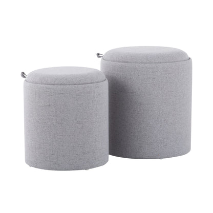 The Tray - Contemporary Nesting Ottoman Set features two round, light gray ottomans of different sizes, each with a fabric pull handle near the top, shown side by side on a white background.