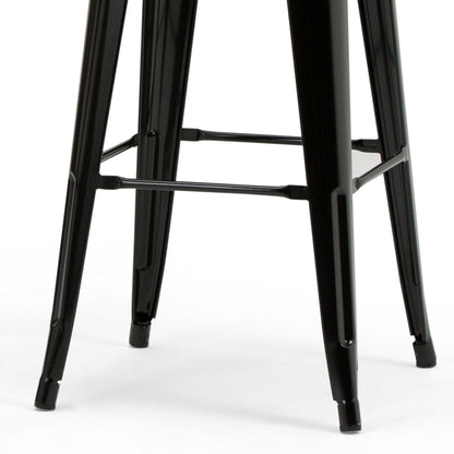 Close-up of the black metal legs and footrest bars of the Rayne - Multifunctional Metal Stool, set against a white background.