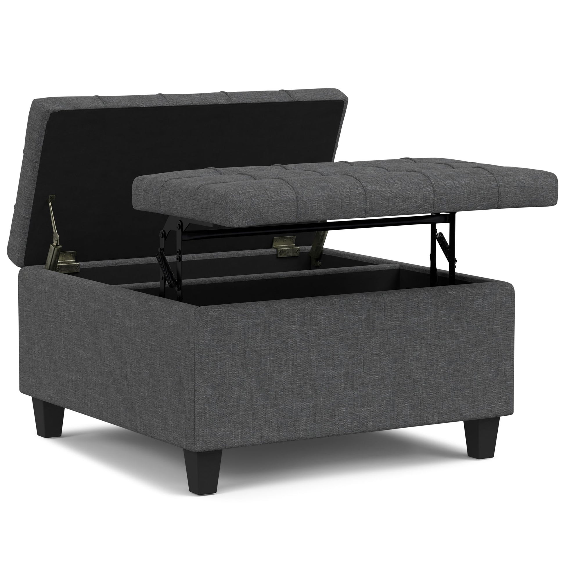 The Harrison Upholstered Coffee Table Storage Ottoman features a gray tufted, lift-top lid that opens to reveal spacious interior storage and stands on black wooden legs.