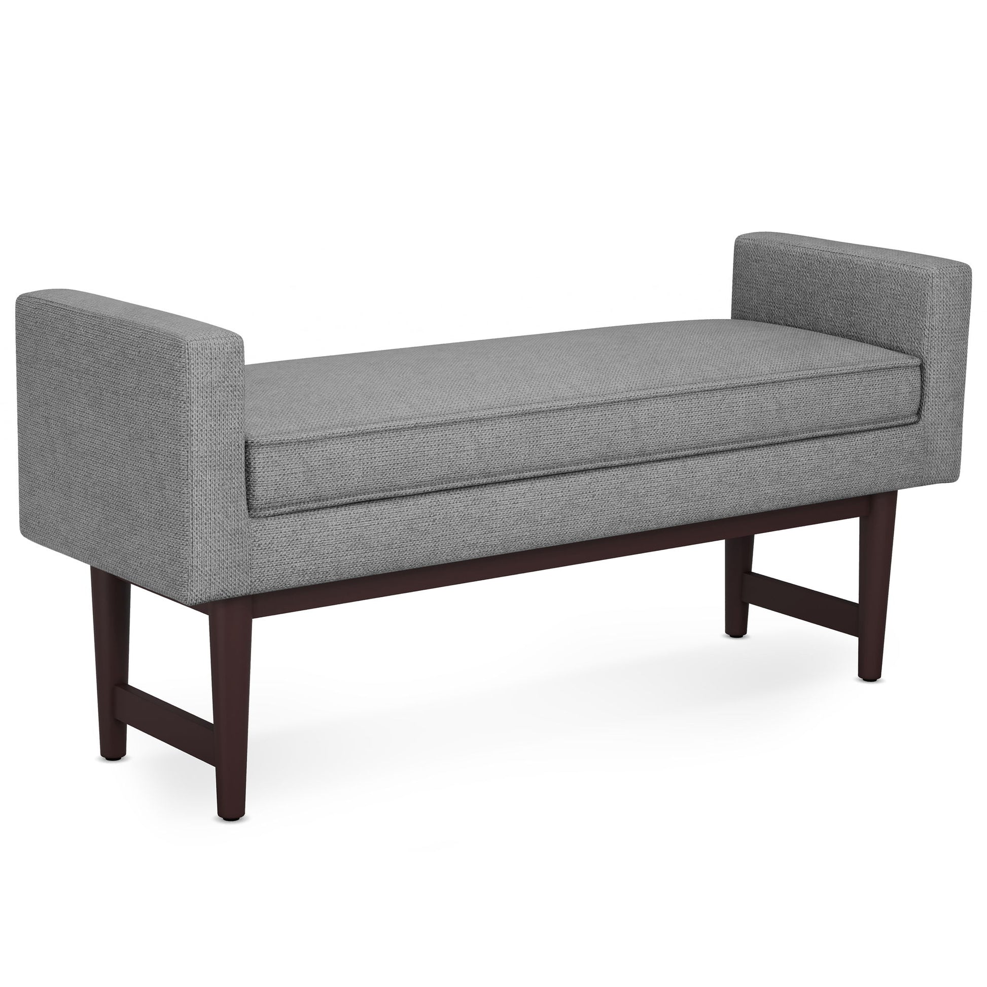 The Scott - Upholstered Ottoman Bench features a cushioned seat in light gray fabric, short armrests on each side, and dark wooden legs for a modern look.