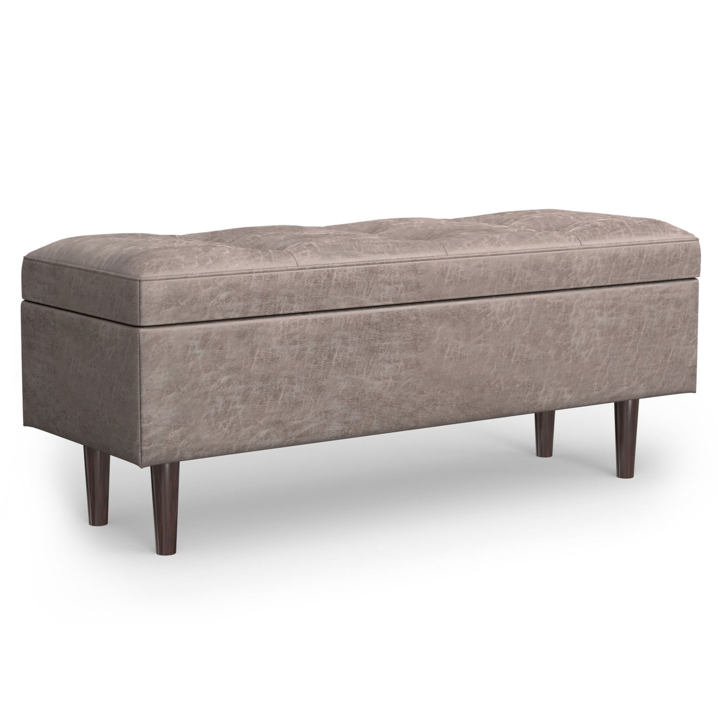 The Shay is a large, square coffee table storage ottoman in mid-century style, featuring taupe upholstery, four dark wooden legs, and a cushioned tufted top.