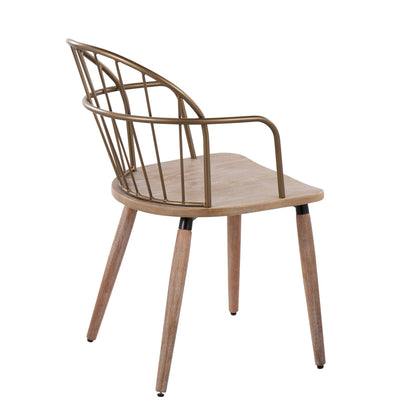 The Riley - Farmhouse Office Chair features a modern wooden frame with four angled legs, a curved seat, and a rounded metal backrest with vertical bars, shown from a rear-side perspective.