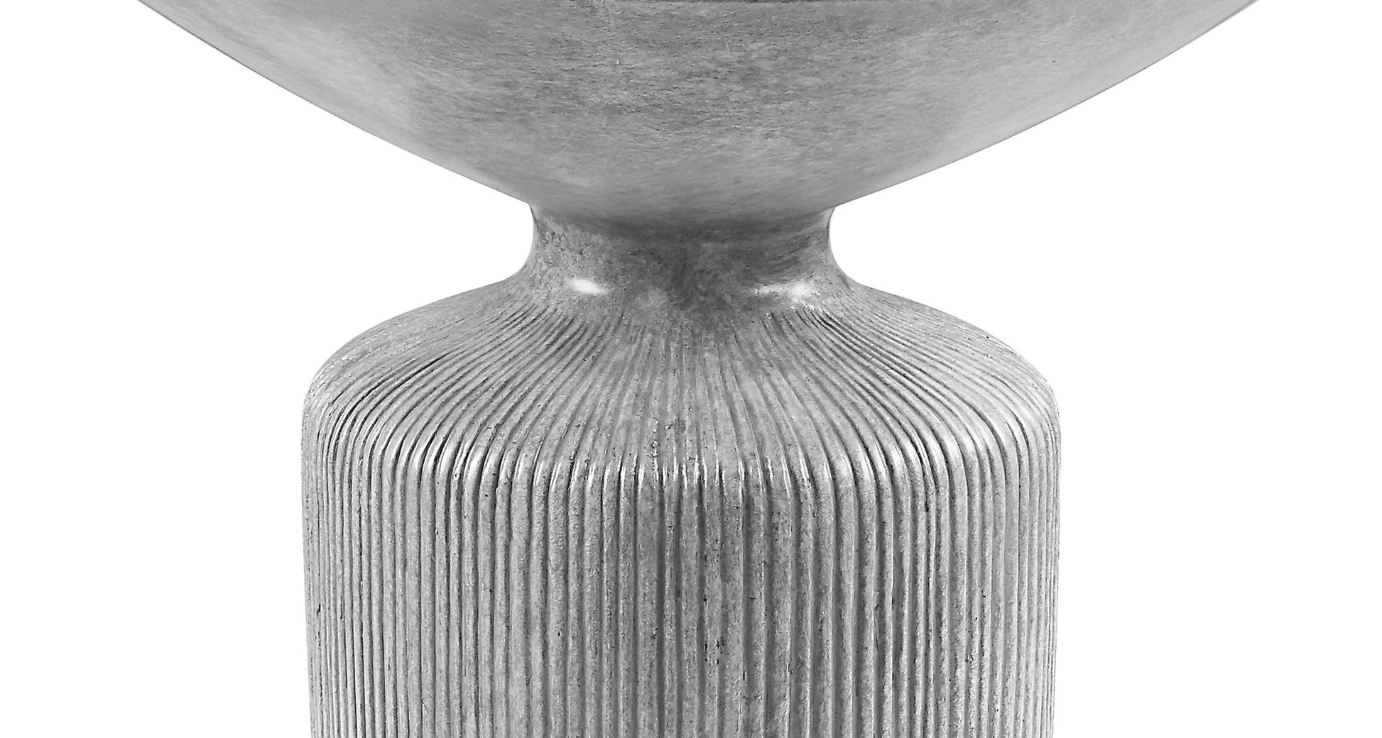 A close-up of the Laddie - Weathered Table, featuring a modern, metallic gray design with a rounded top and a textured, vertically ribbed cylindrical base against a white background.