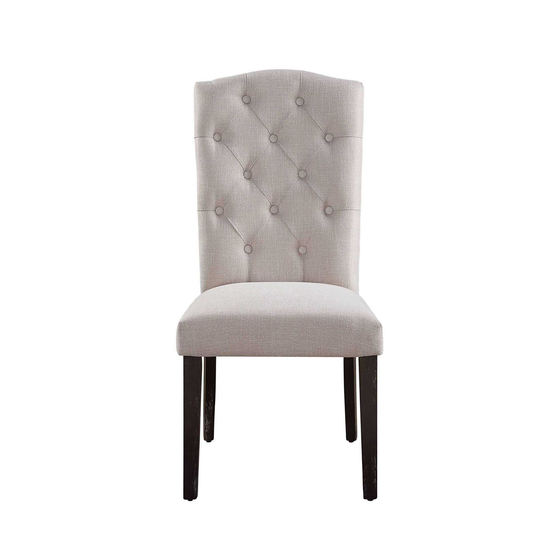 The Gerardo Linen Weathered Dining Chair (Set of 2) in beige features a tufted backrest and dark wooden legs, shown against a white background.
