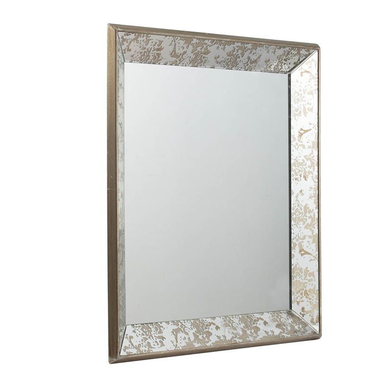 The Antique Rectangle Mirror With Floral Accents features a wide, bevelled frame with subtle silver and gold patterns for an elegant decorative touch. Usable as a hanging wall mirror or mirrored display tray.