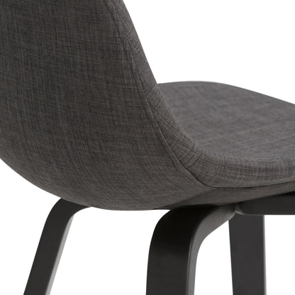 Close-up of the Randolph Bentwood Counter/Bar Height Stool (Set of 2) with a curved, upholstered dark gray fabric seat and backrest, and smooth black wooden legs, shown against a white background.