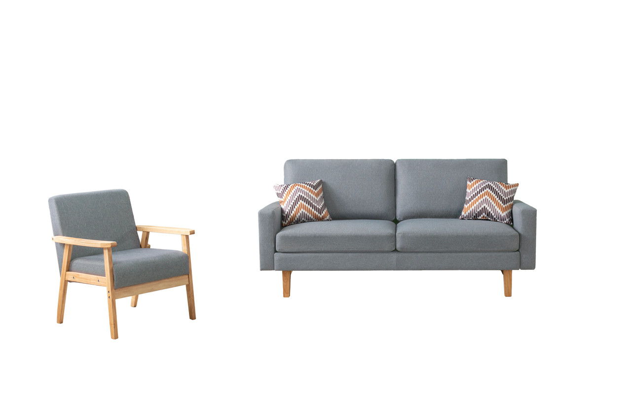 The Bahamas Sofa Set, featuring wooden legs and arms, includes a gray upholstered armchair and a matching two-seater sofa with two chevron-patterned throw pillows, displayed against a white background.