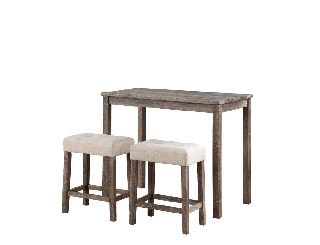 The Lux 3 Piece Counter Height Pub Table set features a wooden table with a rustic finish and two matching tufted linen upholstered stools in beige, neatly tucked under the table.