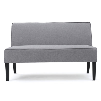 The Contemporary Loveseat With Upholstered Fabric and Birch Wood Legs features a modern armless design in light gray, supported by four black birch legs, and is shown against a white background.