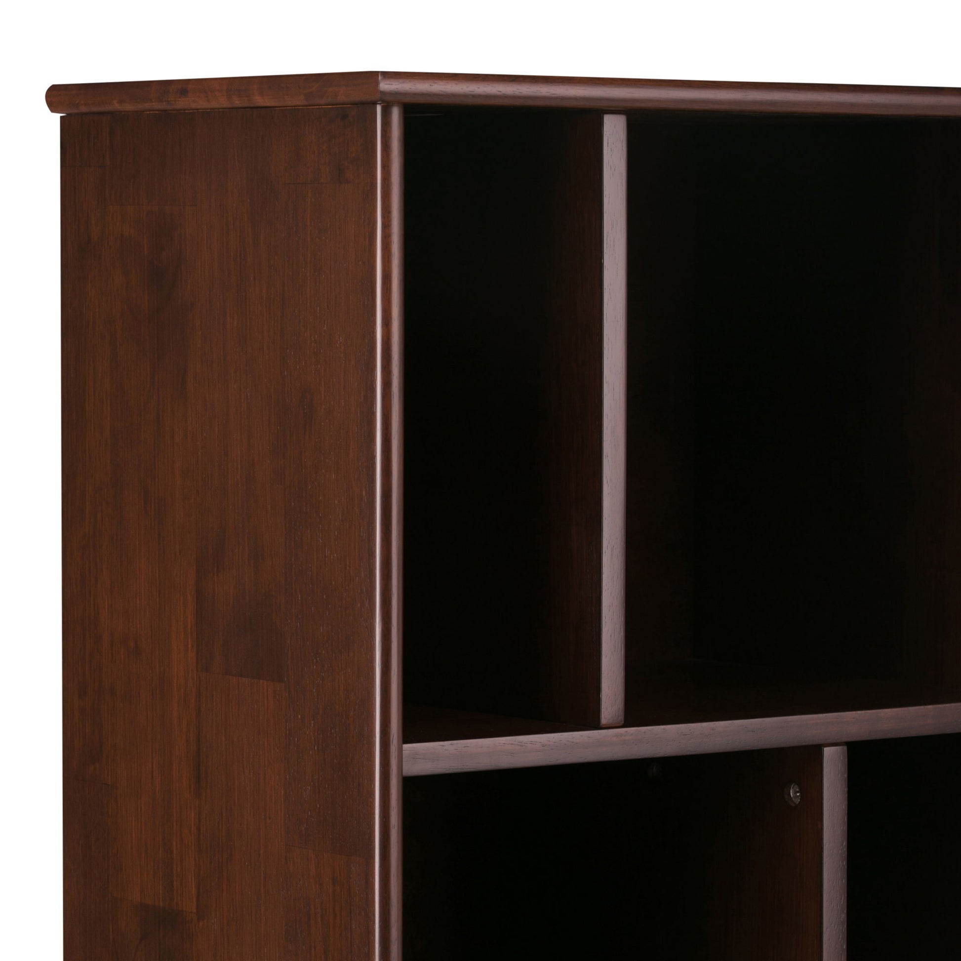 A close-up angled side view of the Draper - Mid Century Wide Bookcase And Storage Unit features a dark brown finish and four square cubby compartments set against a white background.