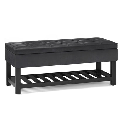 Cosmopolitan Storage Ottoman Bench features a rectangular black tufted cushion, sturdy wooden legs, and an open slatted shelf below—ideal for entryways or at the foot of a bed.