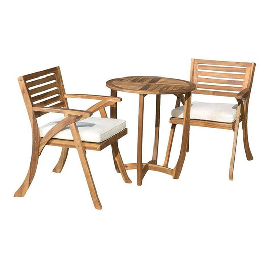 The Outdoor Dining Set With Coffee Table And 2 Chairs - Teak features two teak armchairs with white seat cushions and a matching round table, all displayed on a white background.