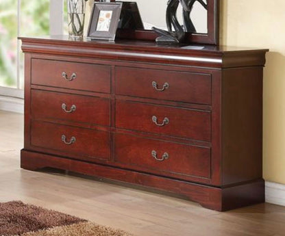 The Louis Philippe III Dresser features durable dark wood construction, six drawers with metal handles, and a matching framed mirror. Set on a light wood floor, the dresser is topped with framed photos and decor for added style.