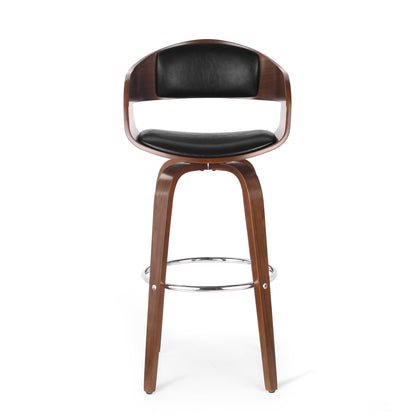 The Modern Bar Stool, Swivel Function features a curved wooden frame, black cushioned seat and backrest, four angled wooden legs, and a chrome circular footrest.