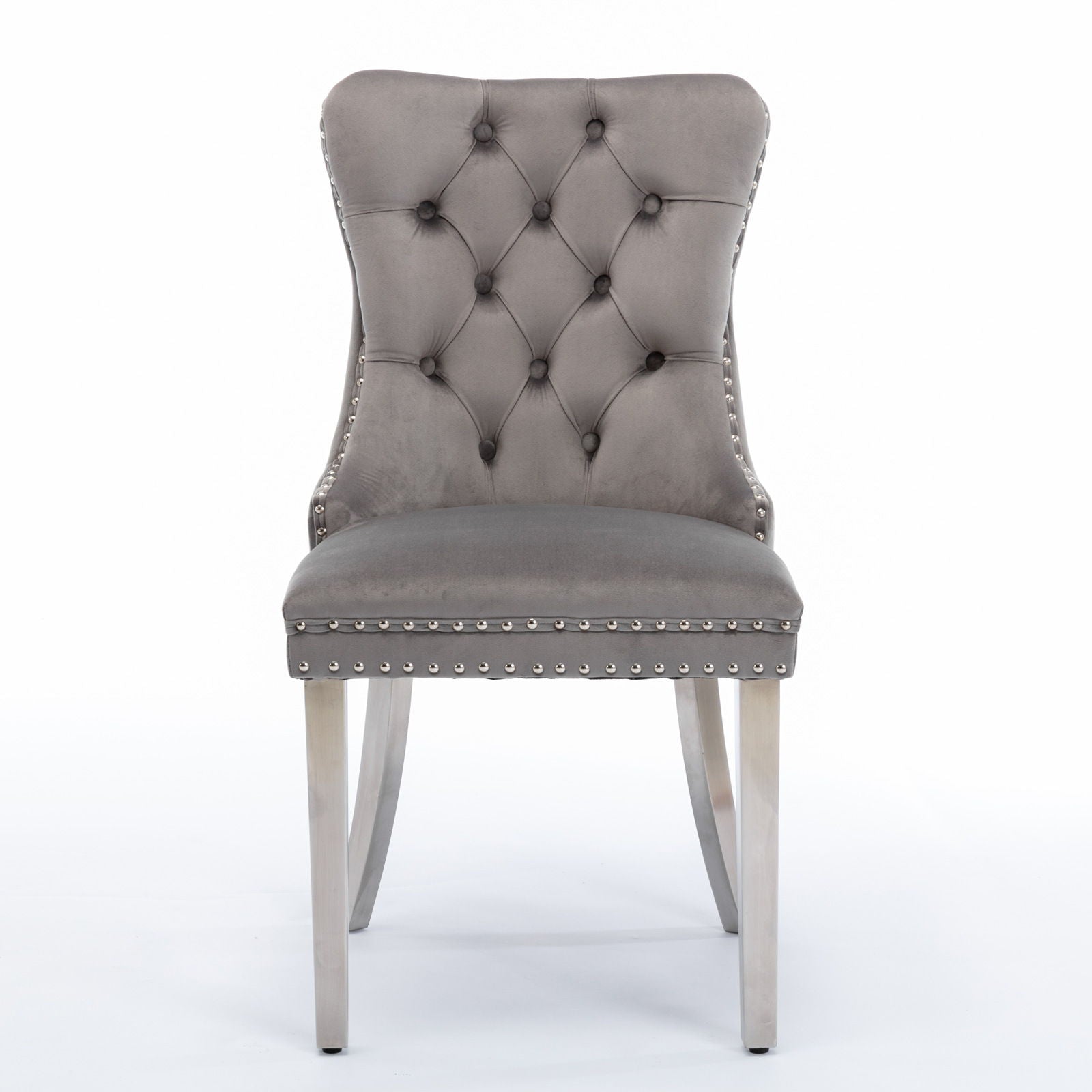 The Nikki dining chair set features modern tufted velvet upholstery, nailhead trim, and chrome stainless steel legs, presented facing forward against a plain white background.