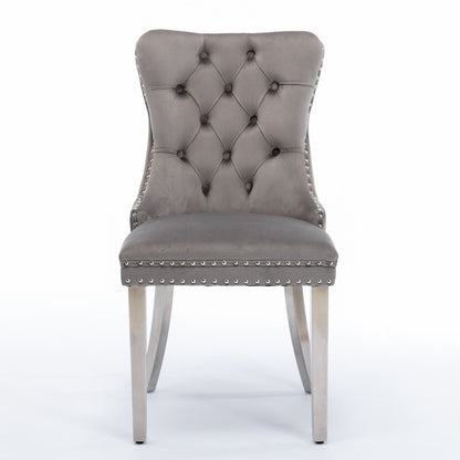 The Nikki dining chair set features modern tufted velvet upholstery, nailhead trim, and chrome stainless steel legs, presented facing forward against a plain white background.