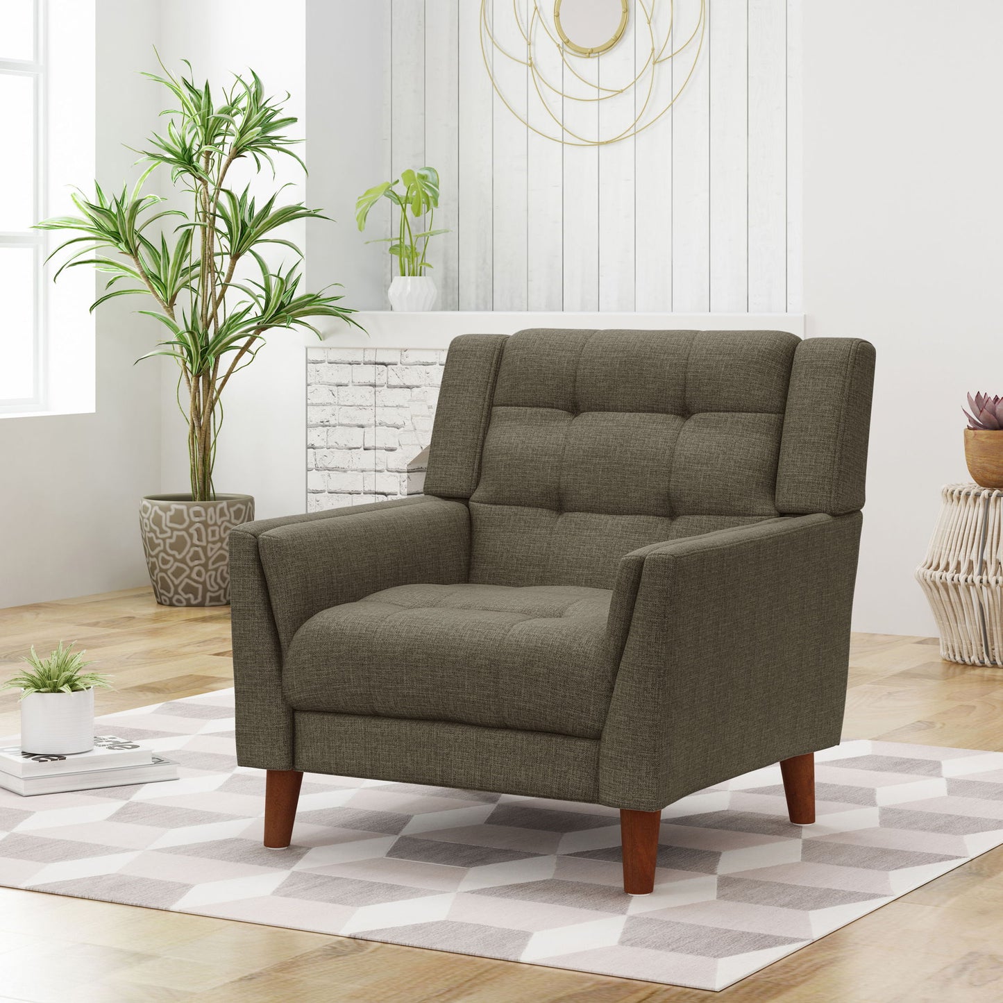 A modern living room featuring the Luminaesque Fabric Upholstered Armchair with a tufted back, set on a patterned rug amid potted plants, wooden floors, and minimalist white walls.