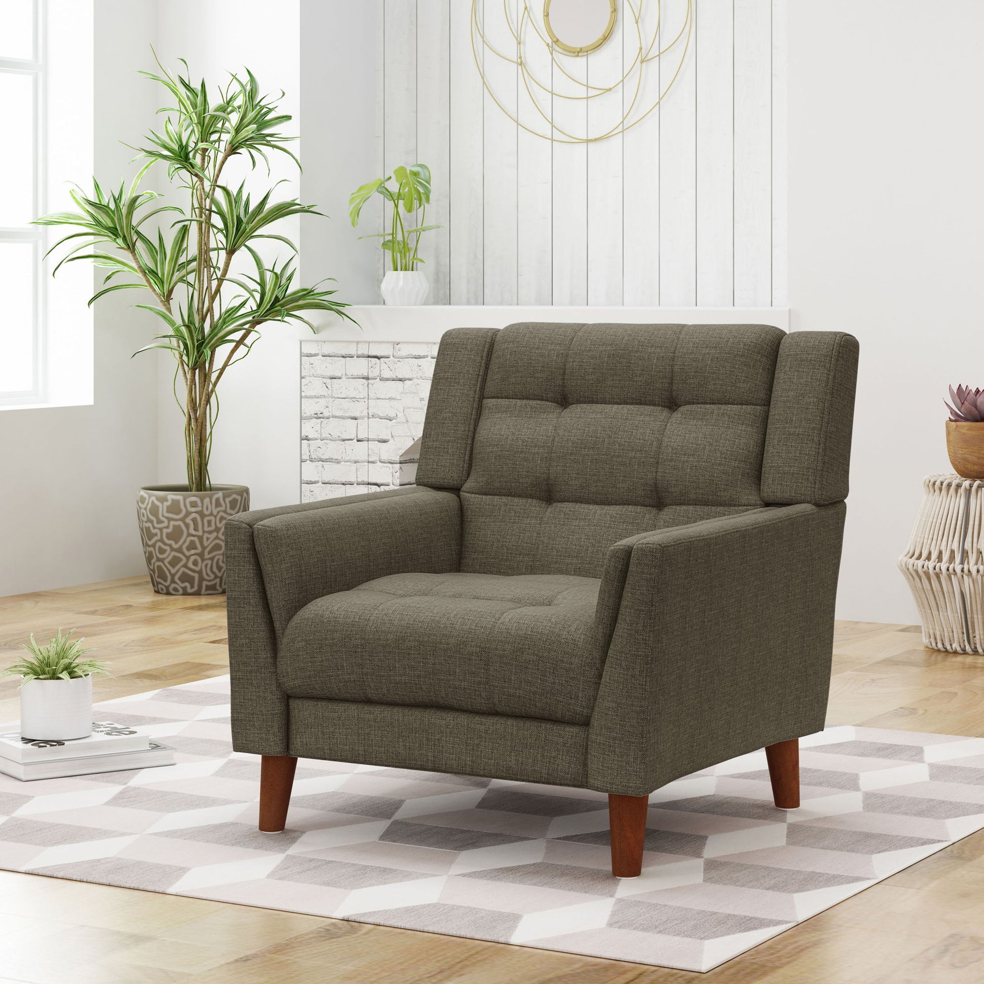 A modern living room featuring the Luminaesque Fabric Upholstered Armchair with a tufted back, set on a patterned rug amid potted plants, wooden floors, and minimalist white walls.