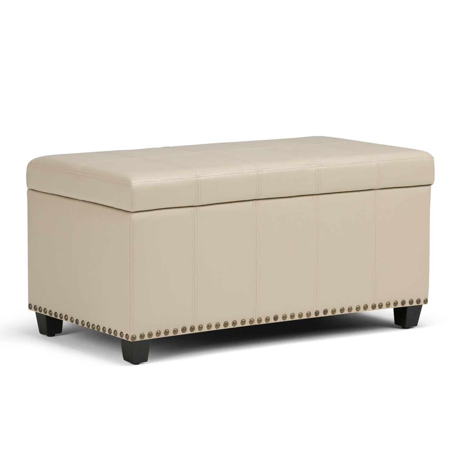 The Amelia Transitional Storage Ottoman Bench features a beige rectangular design, cushioned tufted lid, decorative nailhead trim on the bottom edge, and short black legs.