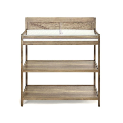 The Barnside - Changing Table Vintage features a rustic light brown wood finish, a raised back, cushioned changing pad, and two open storage shelves below.