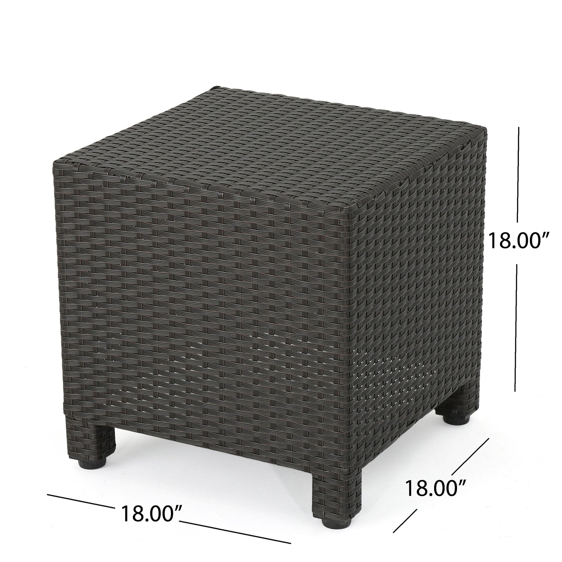The Puerta Minimalist Style Accent Table is a dark brown, square wicker table with woven design, short legs, and an open space under the tabletop. It measures 18 inches in height, width, and depth.