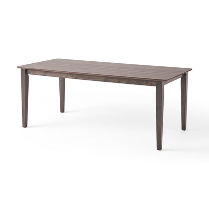 The Farmhouse Charm Dining Table With Square Leg, a rectangular wooden table with a smooth dark brown finish, is shown against a plain white background.
