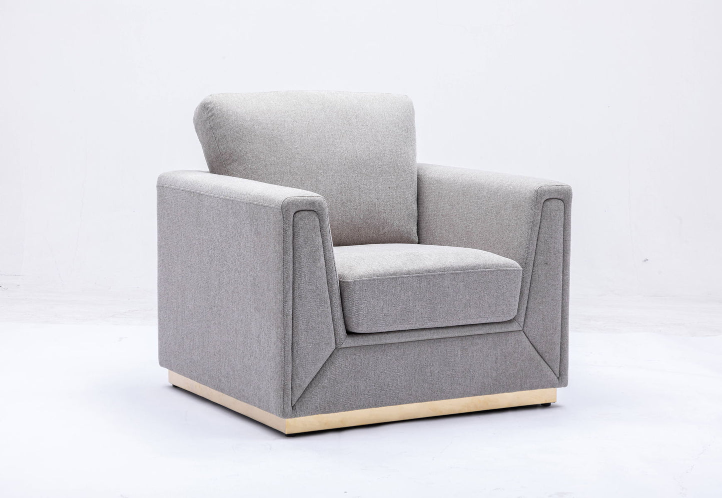 The Couch.com Valin Linen Chair features a modern, square design with wide armrests and cushioned seat and backrest in gray fabric. Its wooden base adds style, making it a perfect contemporary addition to any living room.