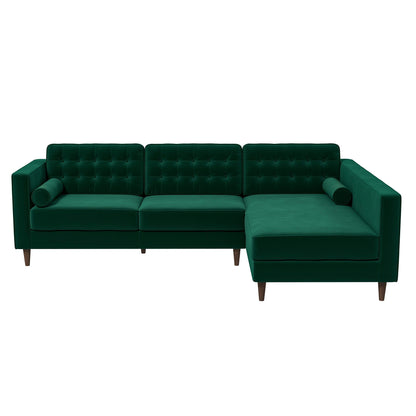 The Christian Mid-Century Modern Design Sectional Sofa features an emerald green finish, tufted back cushions, square arms, wooden legs, a right-side chaise, and includes two cylindrical bolster pillows.