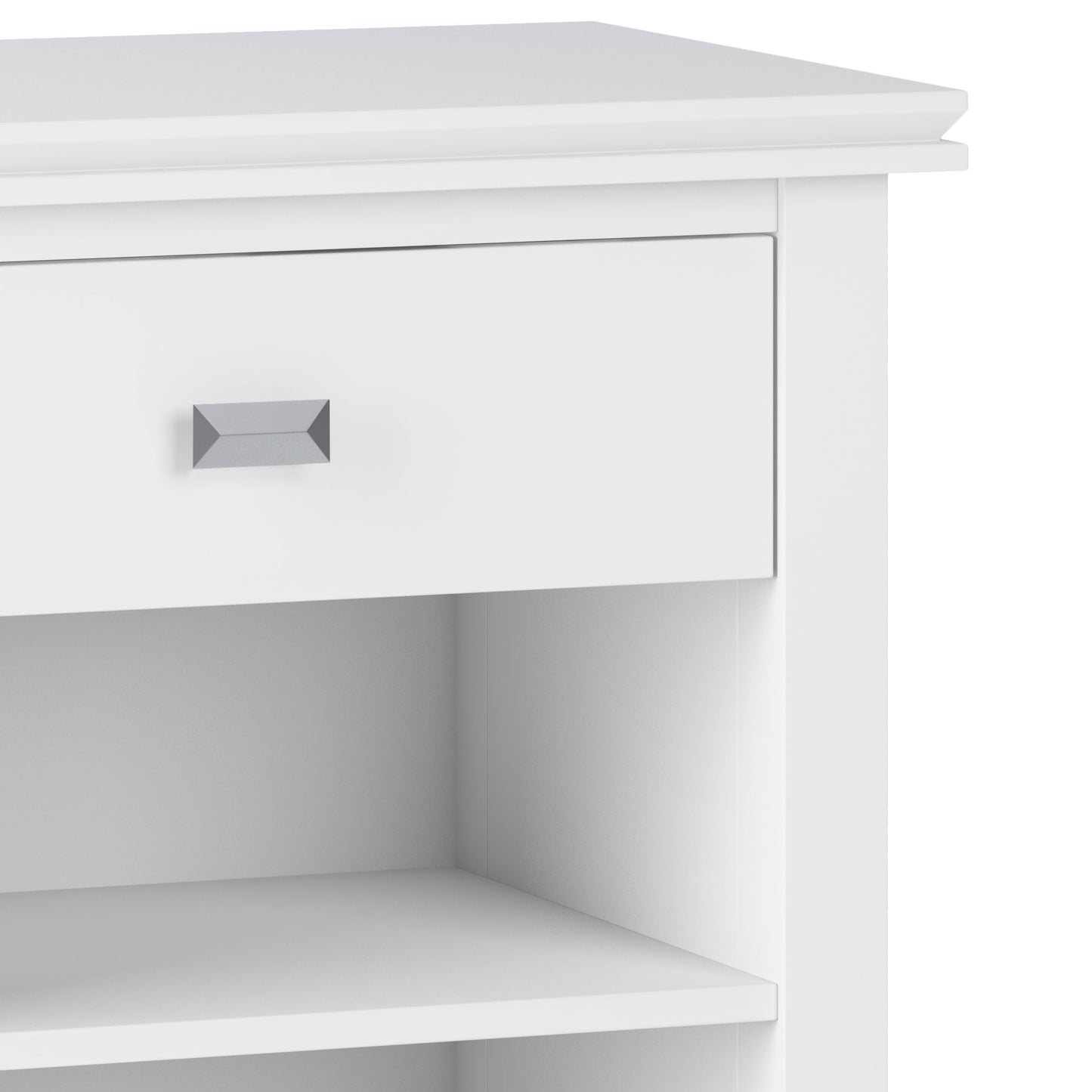 Close-up of the Artisan - Handcrafted Bedside Table, a white cabinet with a single drawer featuring a rectangular metallic handle and an open shelf below.