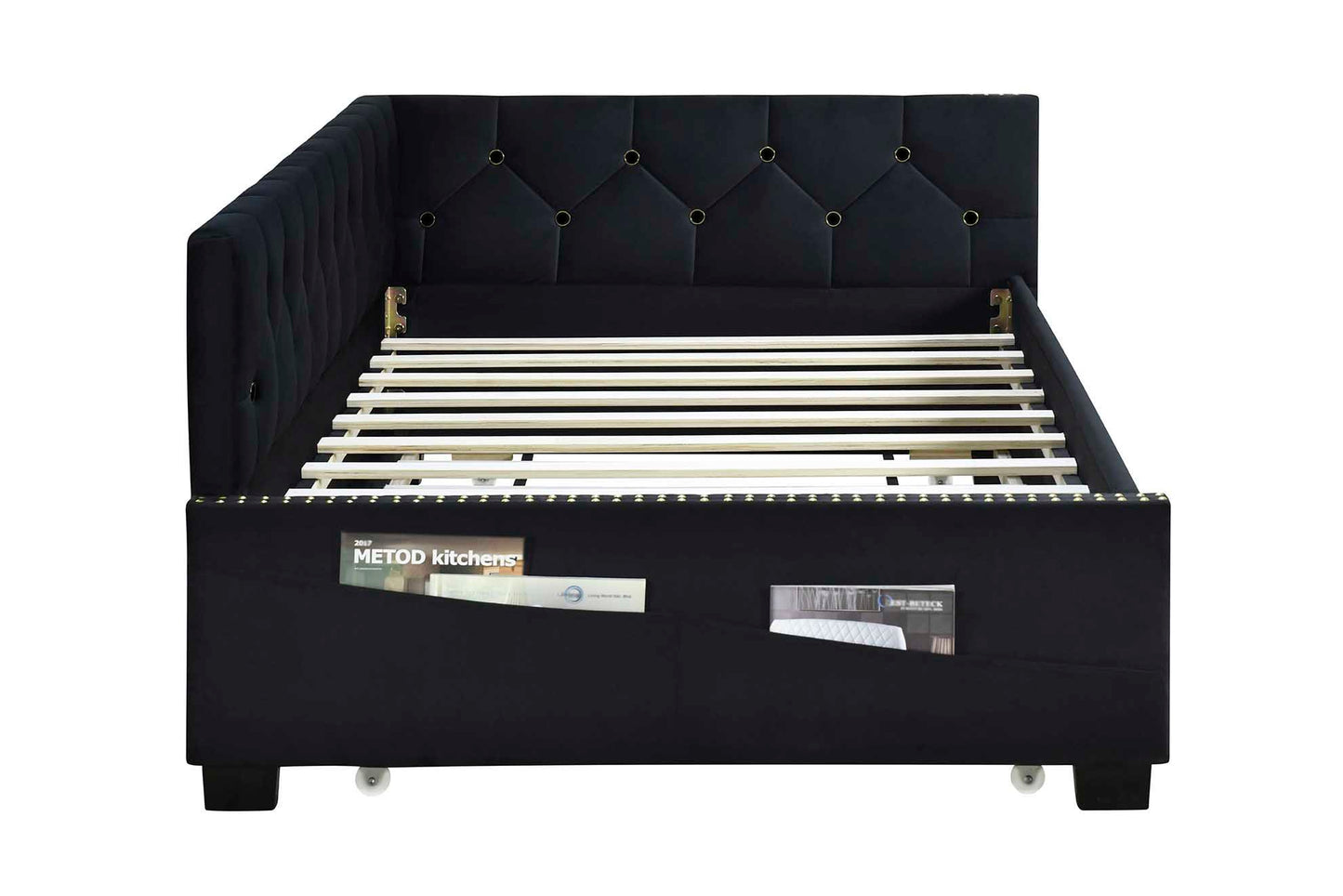 The Upholstered Twin Size Daybed Bed Frame features velvet fabric, a studding design, a convenient trundle, and requires no box spring. Shown on a white background.