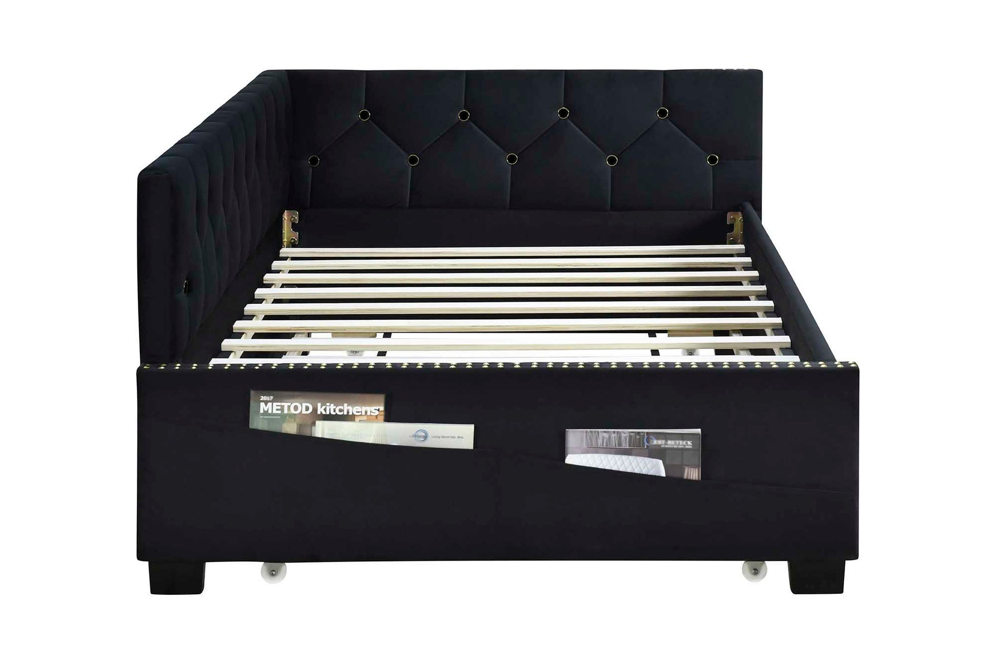 The Upholstered Twin Size Daybed Bed Frame features velvet fabric, a studding design, a convenient trundle, and requires no box spring. Shown on a white background.