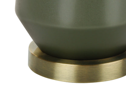 Close-up of the base of the Lighting, Table Lamp, Green Ceramic, Contemporary - Green resting on a round brushed gold metal stand.